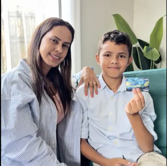 Modak family — mom and son on the couch