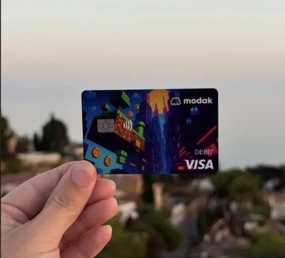 Modak family — card outdoors at sunset